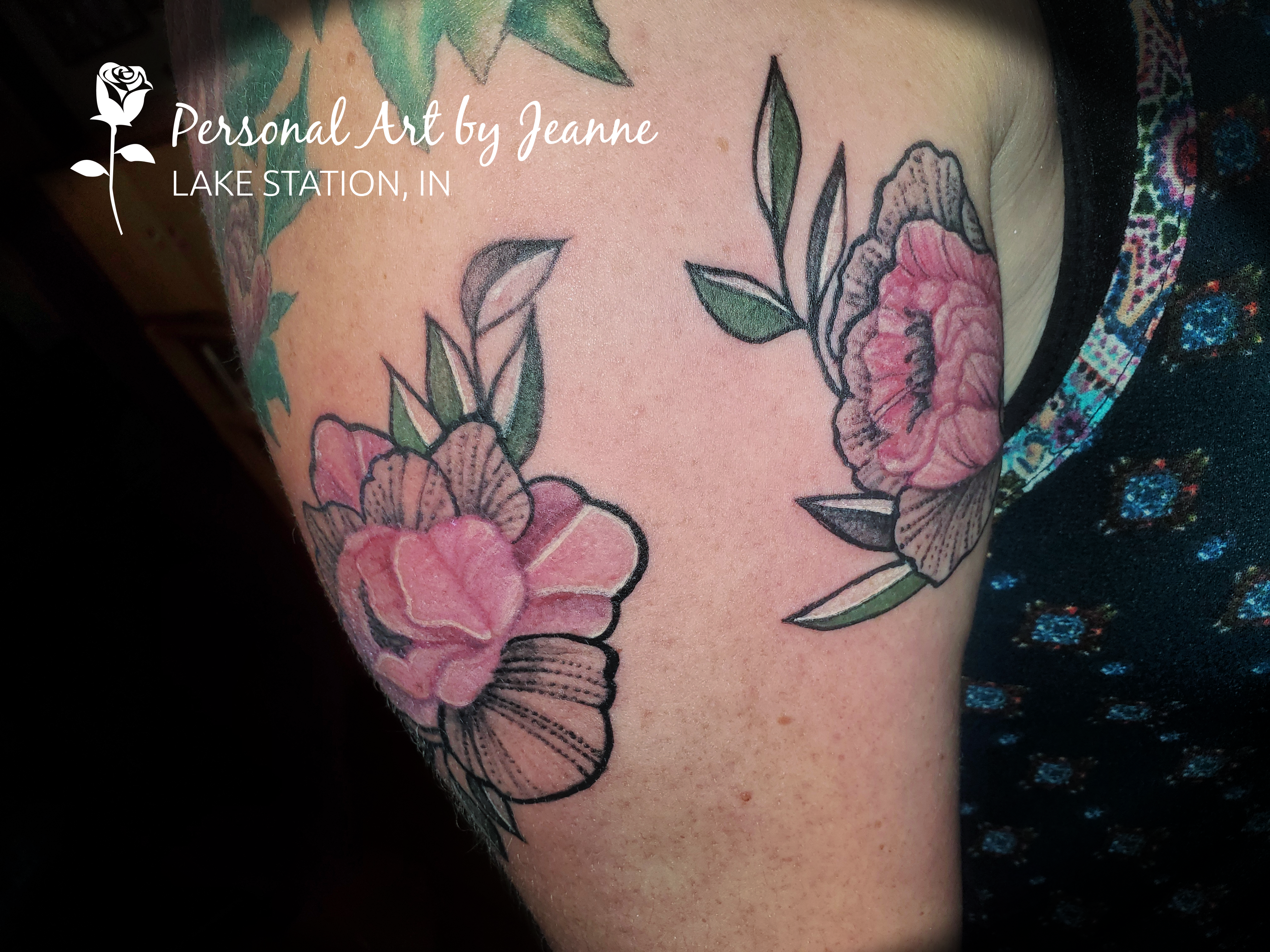 peony tattoos on an arm done by Jeanne at Personal Art